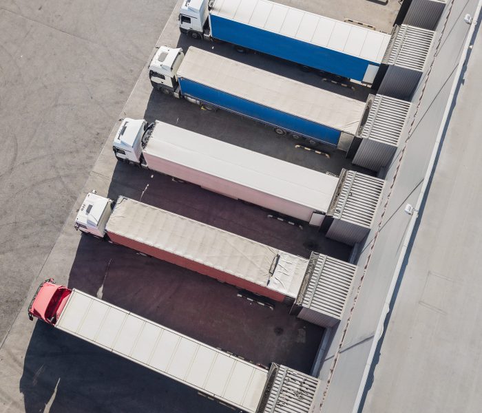 trucks-unloading-in-logostics-center-2026-01-06-10-37-56-utc (1)